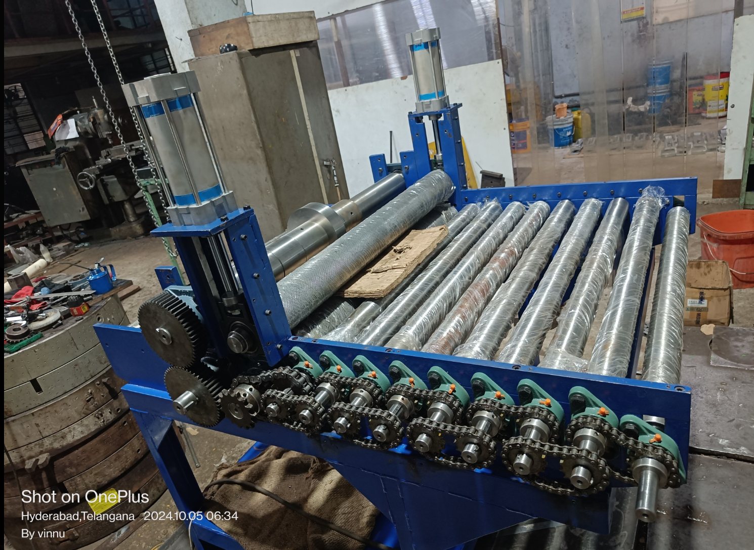 Roller conveyor assembly with chain-driven rollers manufactured by Radiant Machine Tools